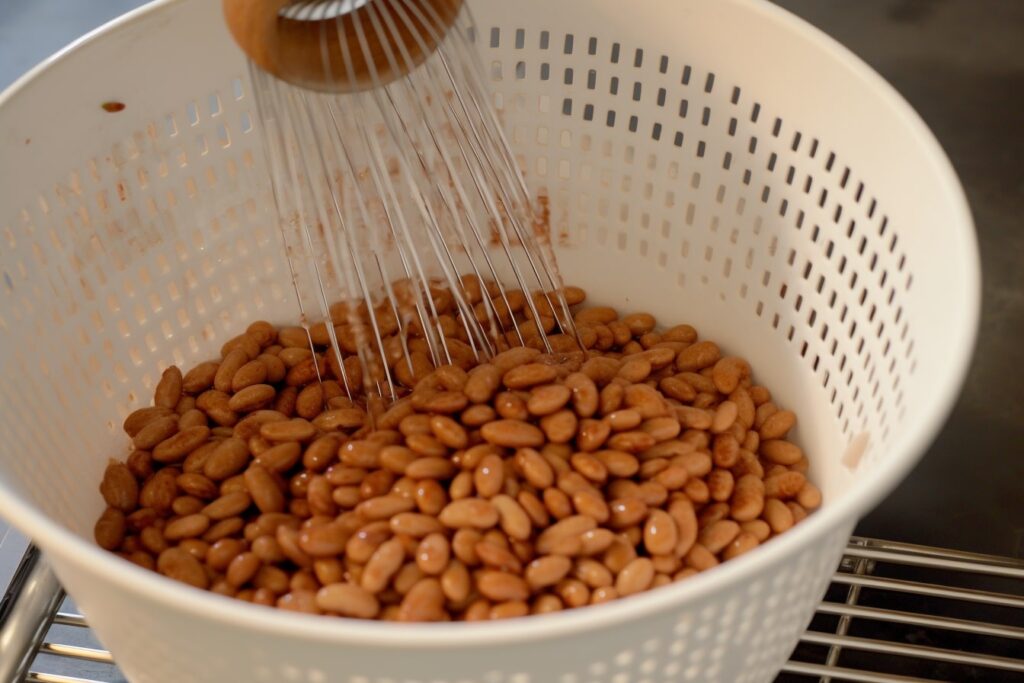 Due to pressure canning method I recommend fast boil for pinto bean