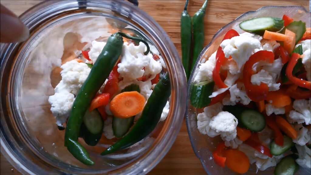 Some spicy green peppers for dynamic flavor torshi