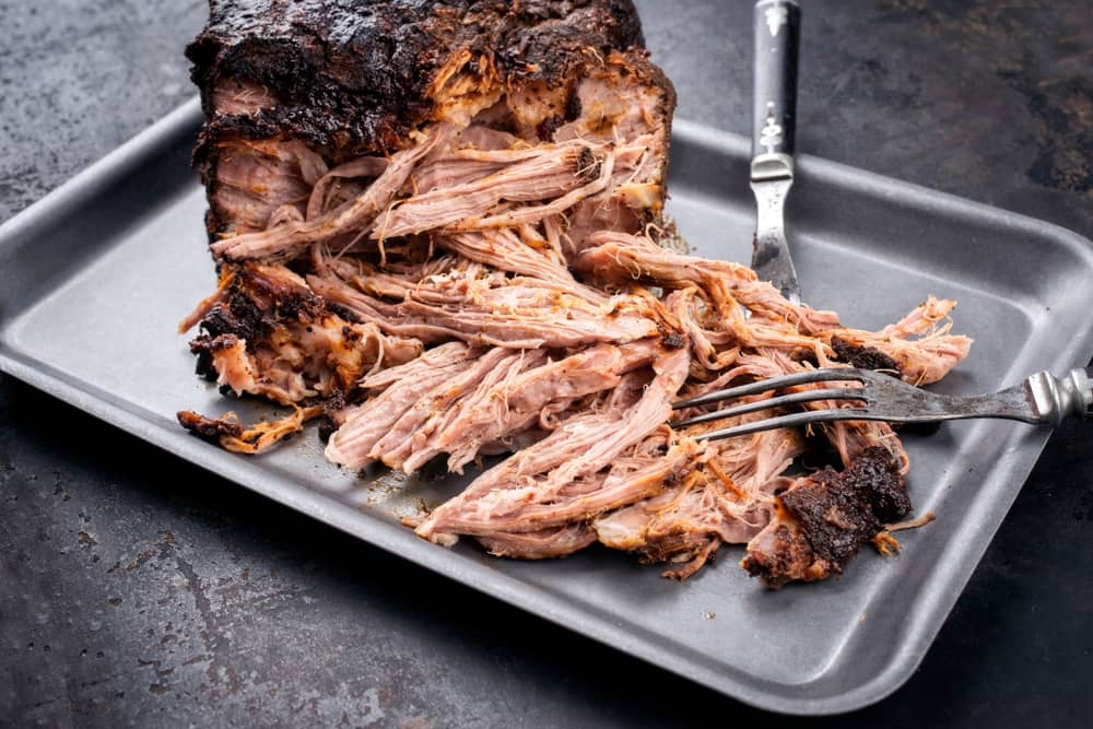 Shredding that yummy, smoky cooked boston butt and be ready for canning now