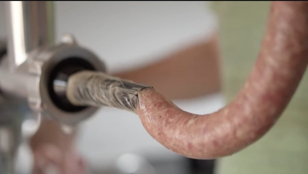 butifarres use a long chopstick gently push the minced meat down to the bottom, but keep in mind that take it slow, or else the sausage casing may break