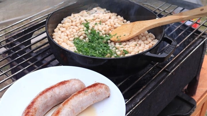 catalan sausage and beans add boiled white beans and finely chopped parsley,when the garlic turns golden and carries such a beautiful smell