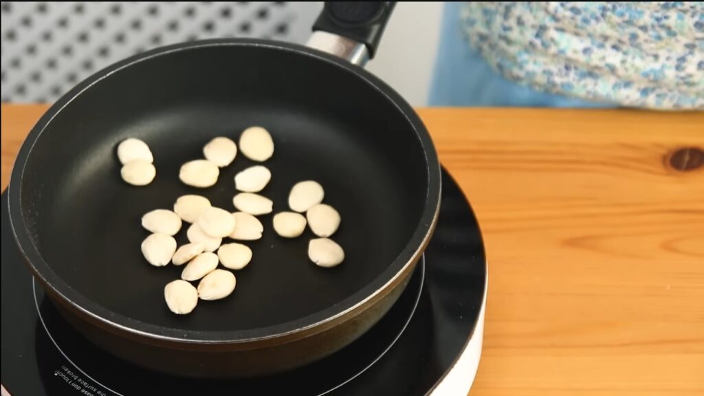 olla gitana fry toast almonds in pan with low to medium heat