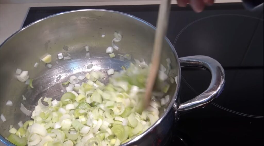 seafood fideua Add chopped onion, leeks, and beautiful slices of celery to the pan, then stir